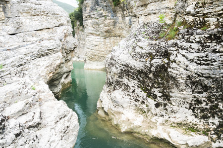 View during a cloudy day of the gorges of the metauro, the canyons formed by the river metauro near the town of Fossombrone during a cloudy day.の写真素材