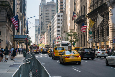 New York City, USA - August 8, 2019:Taxy on Fifth Avenue in front of St. Patrick's Cathedral during a sunny dayのeditorial素材