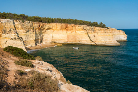 View of a coastal landscape of the Algarve region of Portugal during a sunny dayの写真素材