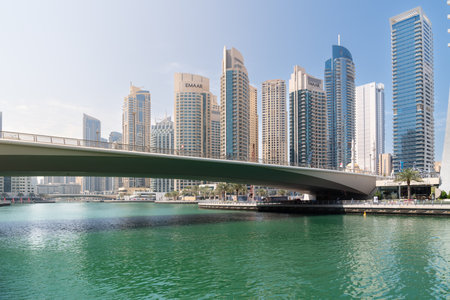 Dubai, United Arab Emirates - March 12, 2023:View of Dubai skyscrapers while walking at Dubai Marina during a sunny dayのeditorial素材