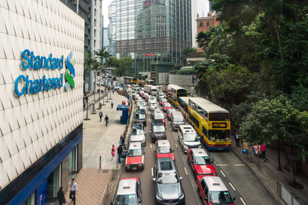 Hong Kong,March 26,2019:traffic in the streets and skyscrapers of Hong Kong during a cloudy day