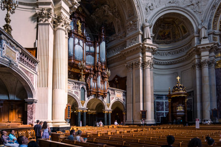 Berlin, Germany-august 9, 2022:people visit the interior of the famous cathedral of Berlin.のeditorial素材