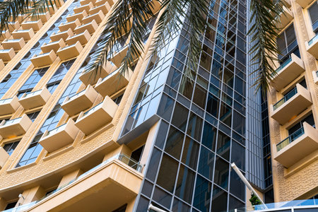 Dubai, United Arab Emirates - March 12, 2023:View of a particular of Dubai skyscrapers while walking at Dubai Marina during a sunny dayのeditorial素材