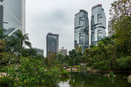 Hong Kong,March 26,2019:Interior of Hong Kong park, a city park surrounded by skyscrapers during a...