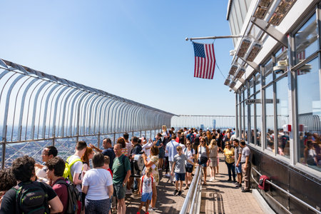 New York City, USA - August 9, 2019:people on the famous observation deck of the Empire State...