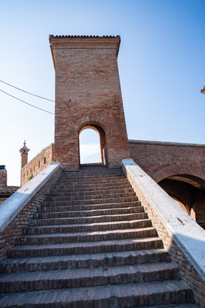 Comacchio ,Italy-June 2, 2023:people stroll in Comacchio in front off the famous three bridges during a sunny dayのeditorial素材