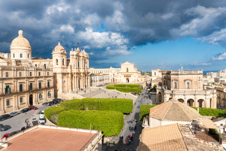 Noto,Italy-May 8, 2022:View of the beautiful Cathedral of Noto from the terrace of the church of Santa Chiara during a sunny dayのeditorial素材