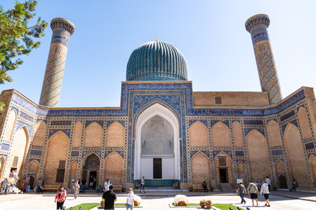 Tashkent, Uzbekistan-August 12, 2023:people in front of the Tamerlane Mausoleum with decorated tombs, mosaics and carvings during a sunny dayのeditorial素材