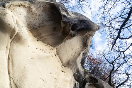 View from below of a detail of the Soprasasso Caves in Emilia during a sunny day.の写真素材
