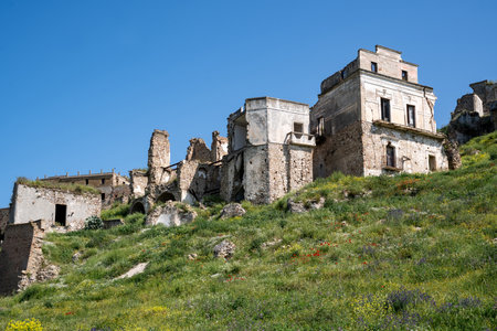 Craco, Italy-April 25, 2025:Some ruins of Craco, the ghost town on a sunny dayのeditorial素材