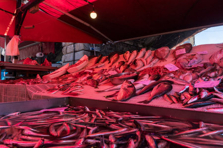 Catania, Italy-May 14, 2022:Fresh fish for sale in the traditional market of Catania, Sicily, on a...
