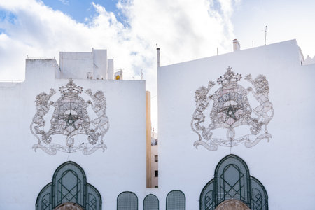 Tetouan, Morocco -march 26, 2024:White buildings decorated with heraldry in Michouar Square in Tetuan on a spring dayのeditorial素材