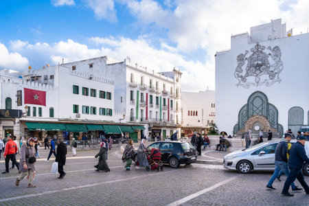 Tetouan, Morocco -march 26, 2024:People and cars pass through Michouar Square in Tetouan, Morocco, on a spring day.のeditorial素材