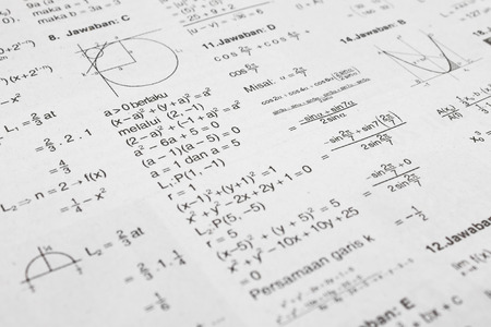 Printed paper full of math equation symbolsの写真素材