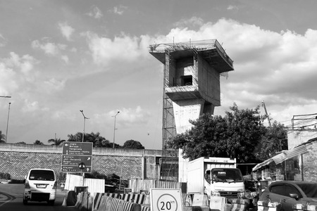 Jakarta, Indonesia - June 22, 2016: Flyover bridge construction pillar for the bus rapid transit corridor in Jakarta.のeditorial素材