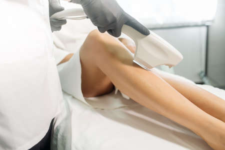 Laser hair removal in a cosmetology clinicの写真素材