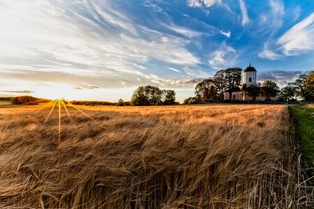Autumn Sunset  Fasterna Church Fasterna Kyrka, Morby, Stockcholm, Sweden.の写真素材