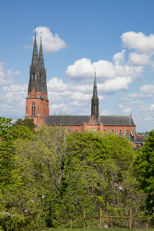 Uppsala, Sweden - May 20, 2016 : Distant view of Uppsala Church from the hill of Uppsala castle.のeditorial素材