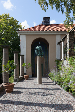 Stockholm, Sweden - Aug 22, 2016 : View of the Carl Mille's garden in summer. This garden is an art museum and sculpture garden, located on the island of Lidingo in Stockholm, Swedenのeditorial素材
