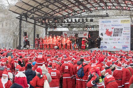 Stockholm, Sweden - Dec 11, 2016 : Stockholm Santa Run, a non competitive charity run for everyone, 2016 at Kungstradgarden Park, Stockholm, Sweden.のeditorial素材