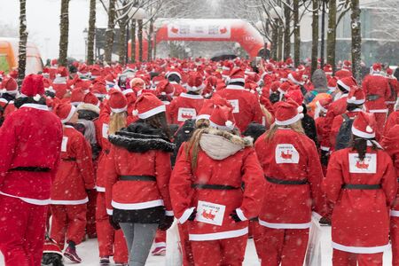 Stockholm, Sweden - Dec 11, 2016 : Stockholm Santa Run, a non competitive charity run for everyone, 2016 at Kungstradgarden Park, Stockholm, Sweden.のeditorial素材