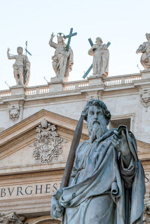 Statue of Saint Paul, the Apostle, in front of the Papal Basilica of St. Peter in the Vaticanの写真素材