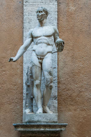 Heroic Romanesque Statue in the Palazzo Mattei di Giove Courtyard, Rome, Italyのeditorial素材