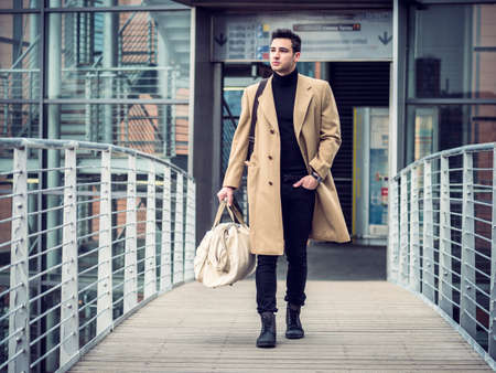 One handsome elegant young man in city settingの写真素材