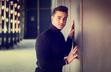 One handsome young man in urban setting in moden cityの写真素材