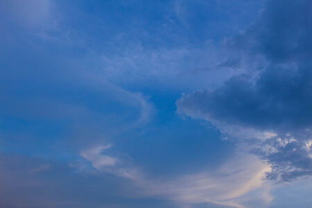 The clouds were fighting on the sky.の写真素材