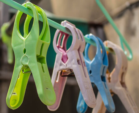 A clothespin on hangers in the house.の写真素材