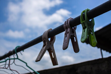 A clothespin on the stripの写真素材