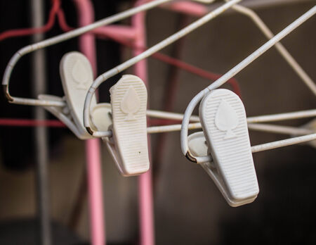 Hangers on a clothes line.の写真素材