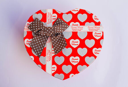 Red heart shaped gift boxes on the floor.の写真素材