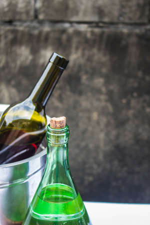 Bottle of white wine and red wineの写真素材