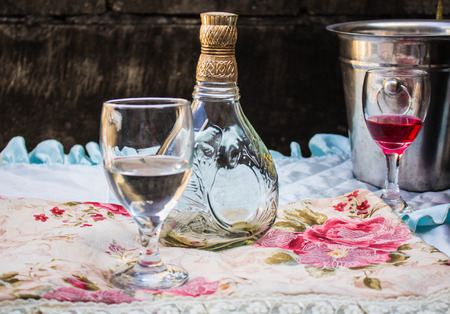 Glass beverage bottles and tableware.の写真素材