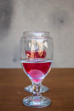 Glass placed close together at a table.の写真素材