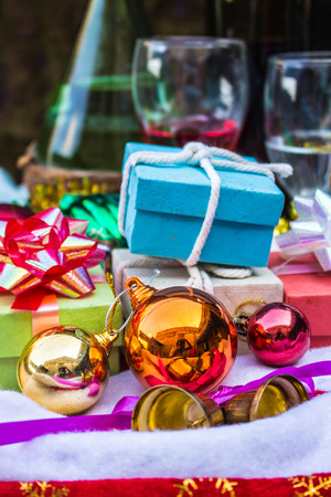 Balls and gifts for festival on tableの写真素材