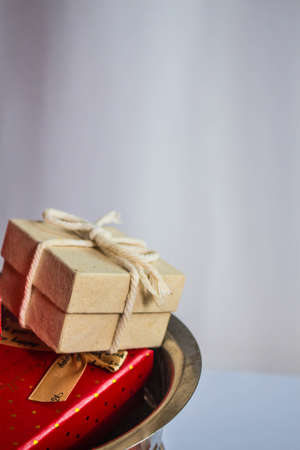 Gift box lying on it.