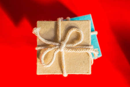 Gift box on red backgroundの写真素材