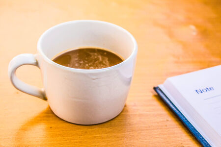 Cup of coffee on the tableの写真素材