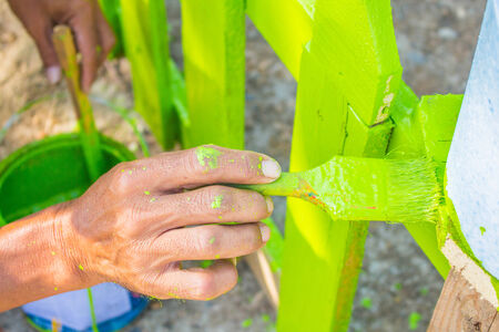 The hand that was holding a paint brushの写真素材