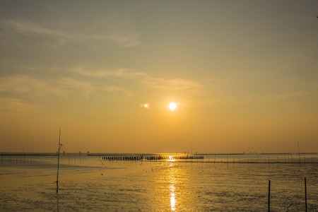Sun at sea in the evening.の写真素材