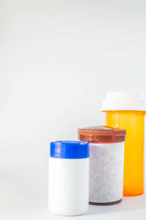 Brown medicine bottle in the middle.の写真素材