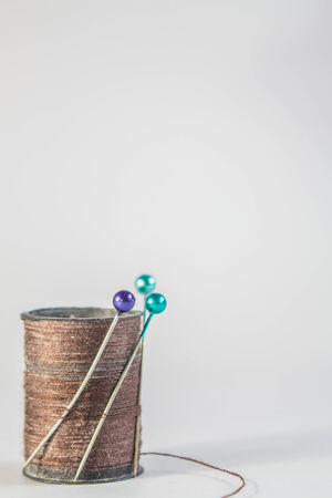 Brown yarn and needles on the floor.の写真素材
