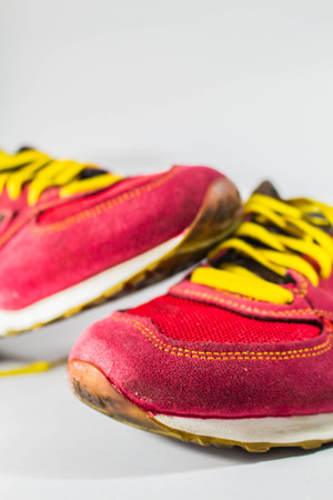 Gym shoes on the floorの写真素材