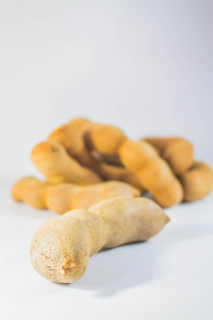 Ripe tamarind placed on the floorの写真素材