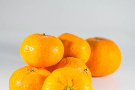 Tangerine put together on a white background.の写真素材