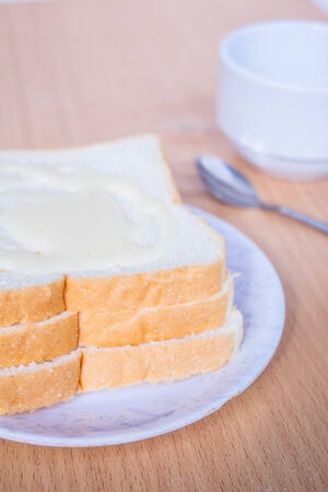 Bread stacked on a plate.の写真素材