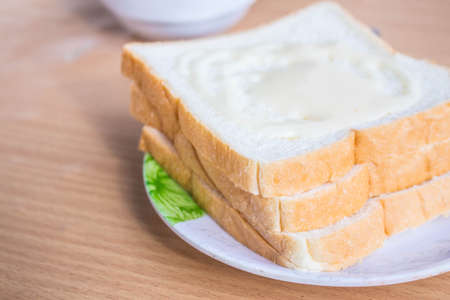 Bread in a plate on the table